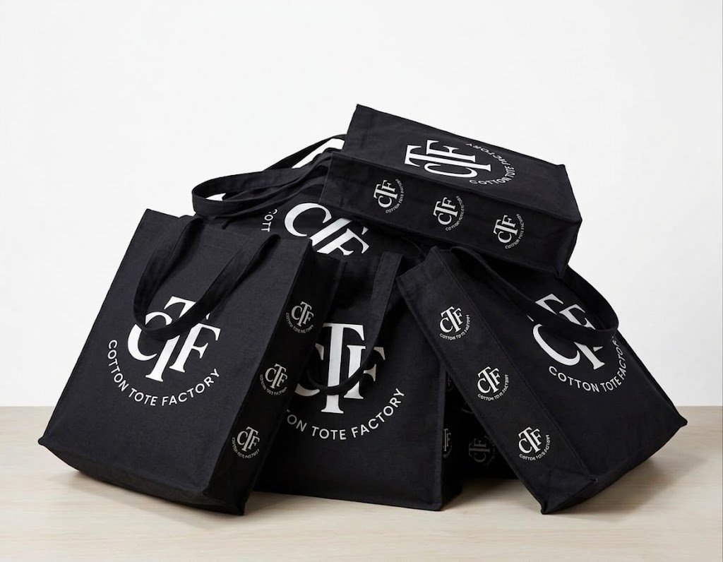 Collection black 180gsm canvas tote bags with 3 side gazette logo printed - Cotton Tot Factory