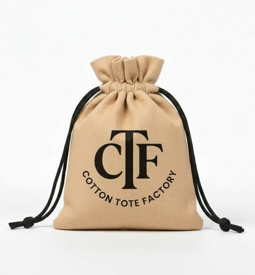 beige drawstring bag with black CTF logo print - Cotton Tote Factory